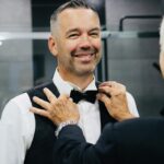 Confident young man with clean skin, neatly styled hair, and well-groomed appearance demonstrating daily grooming habits for men