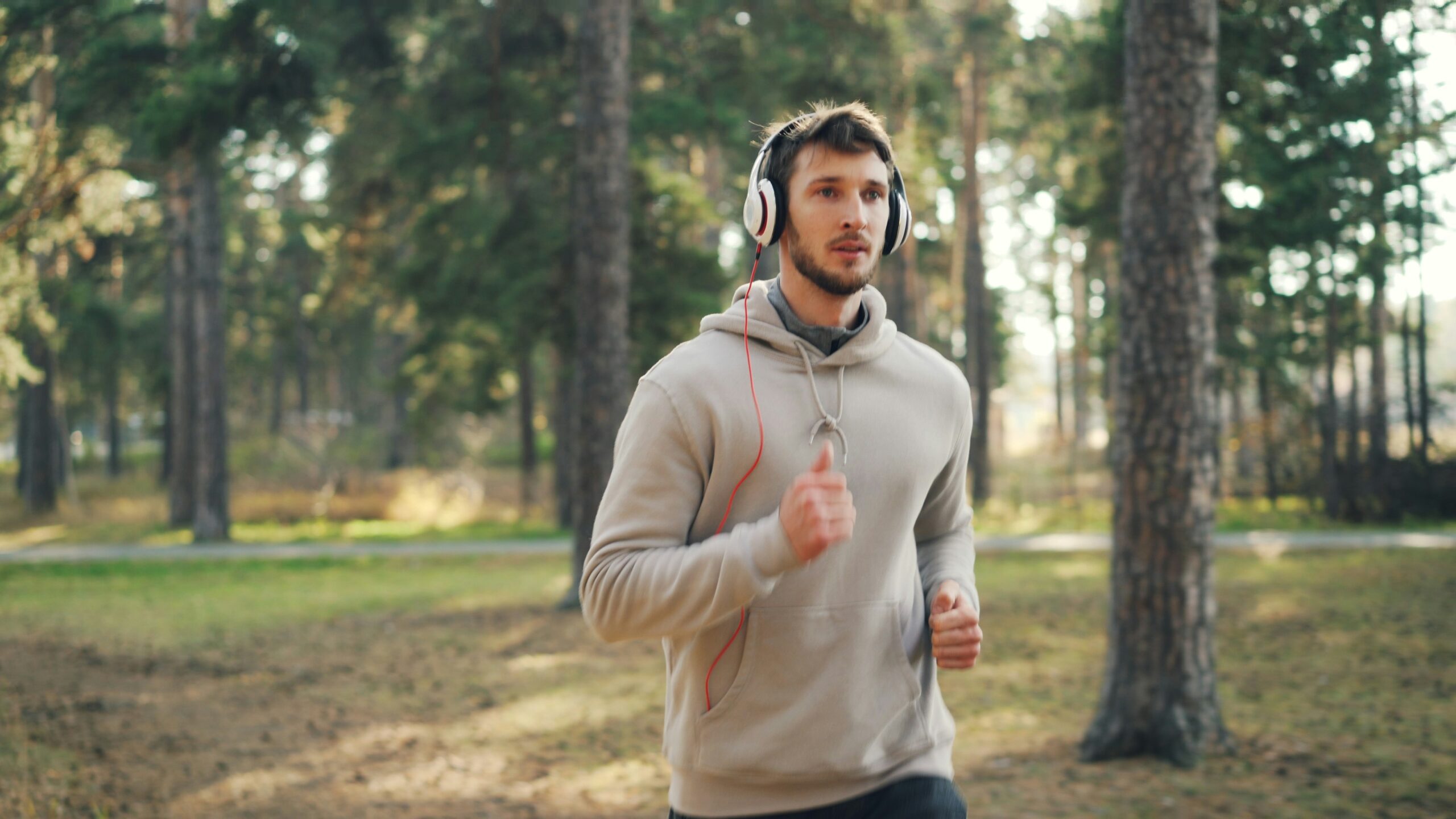 Man running outdoors to improve blood circulation and reduce hair fall
