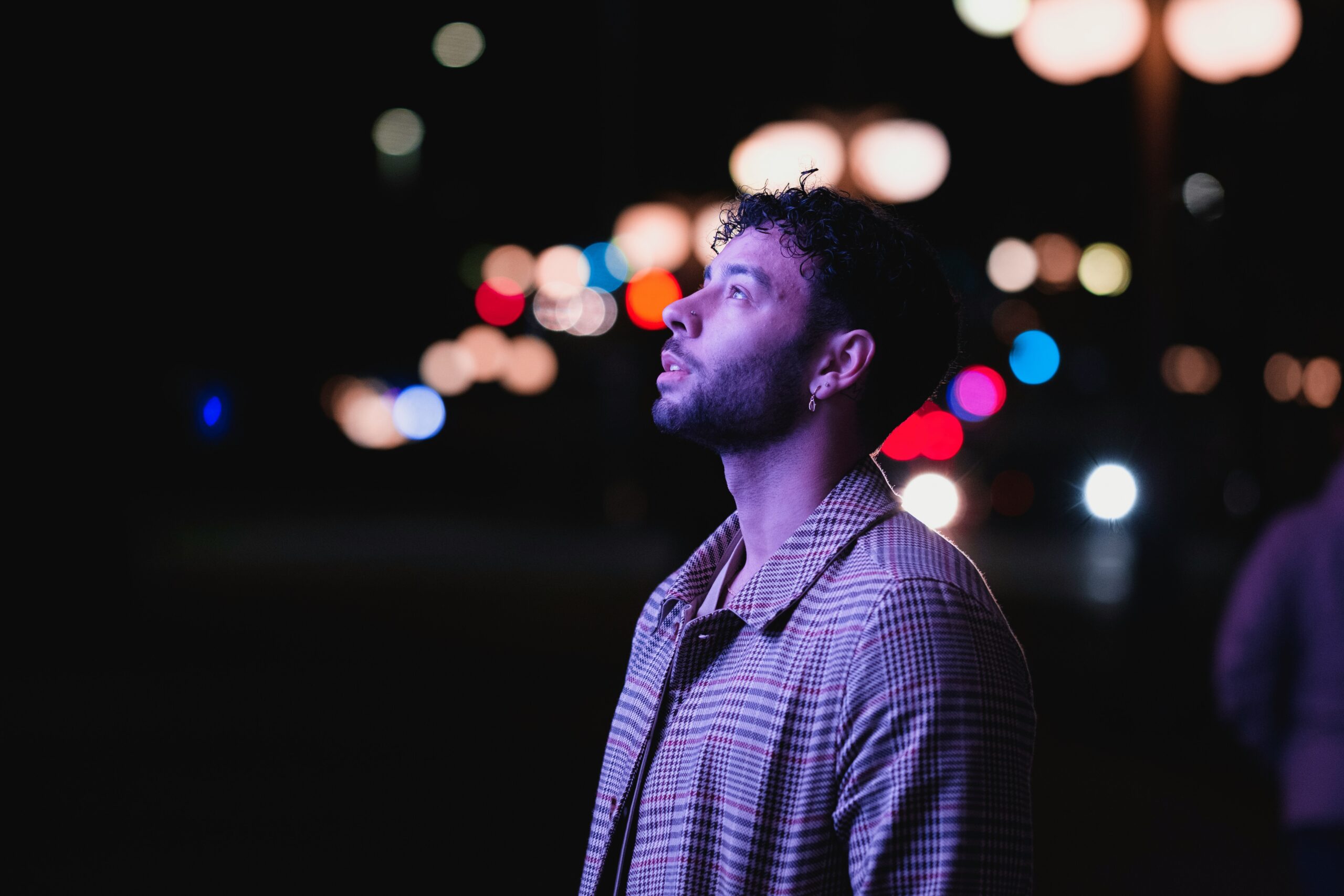 Man relaxing outdoors, protecting mental peace